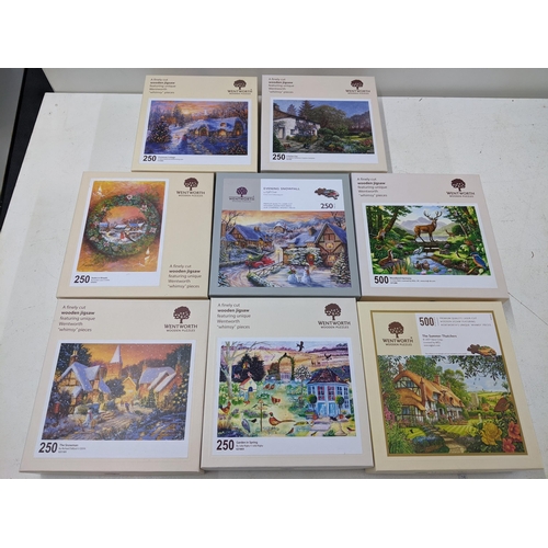 553 - Eight Wentworth boxed jigsaw Puzzles to include 'The Summer Thatchers' by Steve Crisp, 'Woodland Har... 