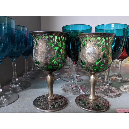 577 - Victorian and later drinking glasses to include a set of six turquoise bowled glasses, eleven cranbe... 