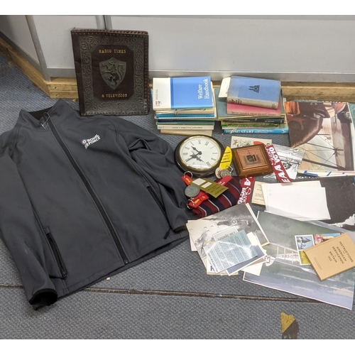 524 - A mixed lot to include an RAF jacket, books, aviation photographs and other items Location:RAF
If th... 