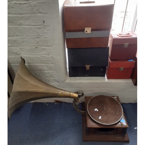 183 - An HMV gramophone on oak base A/F requiring restoration with brass horn together with 4 record cases... 