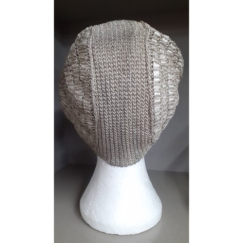 23 - A 1920's French ladies cloche hat having silver metallic thread. Location:R2.1