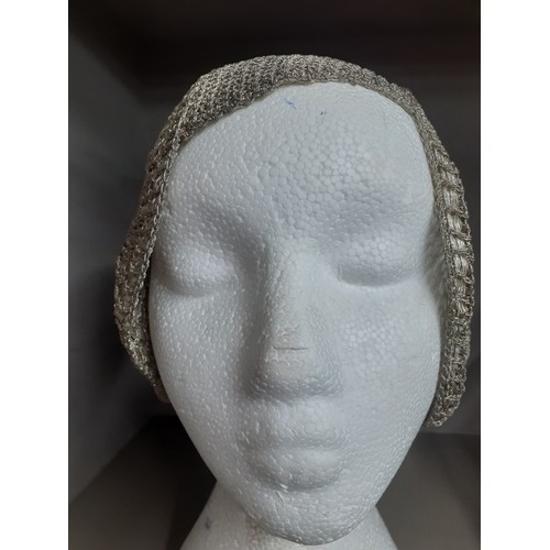 23 - A 1920's French ladies cloche hat having silver metallic thread. Location:R2.1