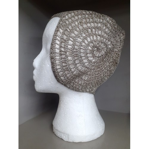 23 - A 1920's French ladies cloche hat having silver metallic thread. Location:R2.1