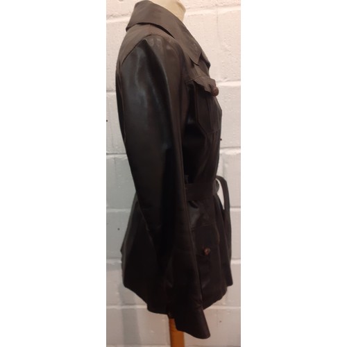 232 - A 1960's Chinchinella of London ladies brown leather fitted jacket with matching tie belt, 4 front b... 