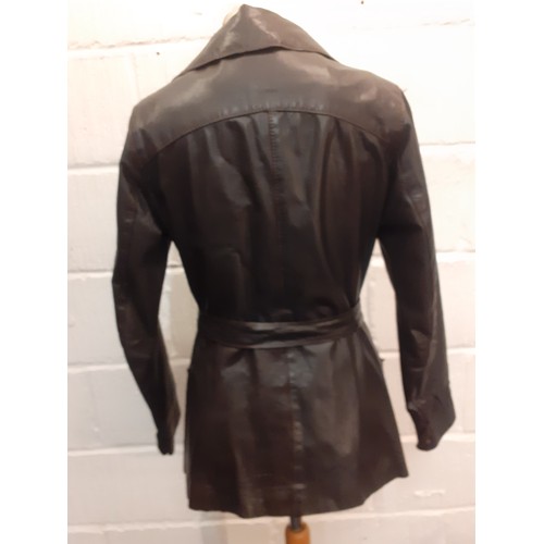 232 - A 1960's Chinchinella of London ladies brown leather fitted jacket with matching tie belt, 4 front b... 