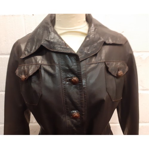 232 - A 1960's Chinchinella of London ladies brown leather fitted jacket with matching tie belt, 4 front b... 