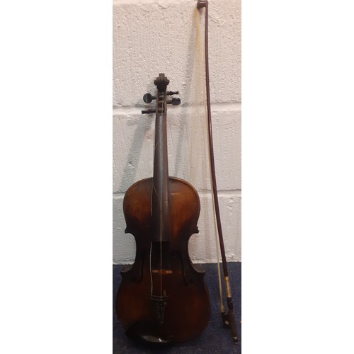 220 - An early 20th Century violin A/F  back measurement 35cm, total length 60cm with bow A/F and fitted c... 