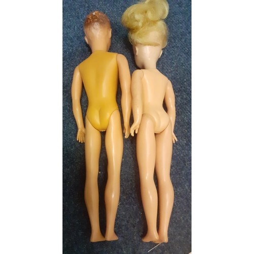 227 - A 1960's Made in Hong Kong Sindy and a 1960's Paul doll together with clothing to include Sindy and ... 