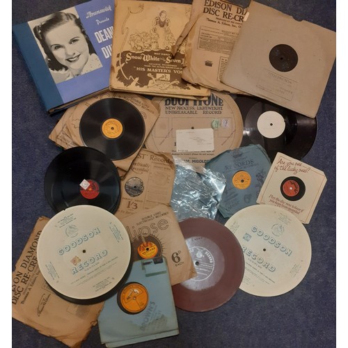 222 - A quantity of gramophone records in various sizes and materials housed in a red record case to inclu... 