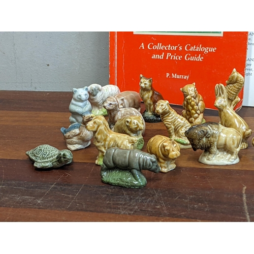 252 - A mixed lot to include Wade figures with a collectors catalogue and price guide, also including thre... 