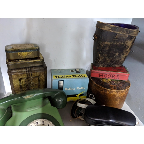 284 - Two hip flasks together with a pair of binoculars, vintage tins, telephone and two cameras
Location:... 