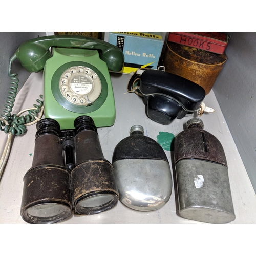 284 - Two hip flasks together with a pair of binoculars, vintage tins, telephone and two cameras
Location:... 