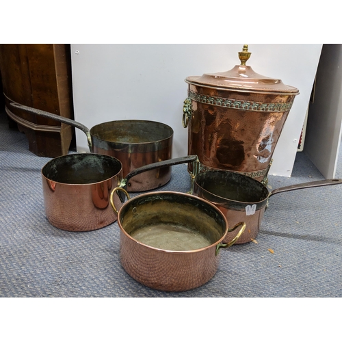 295 - A set of three Victorian copper graduating cooking pots, together with a twin handled pot and a coal... 