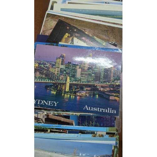 624 - Four postcard albums to include postcards from Snowdon, Thompson River and others, along with a quan... 