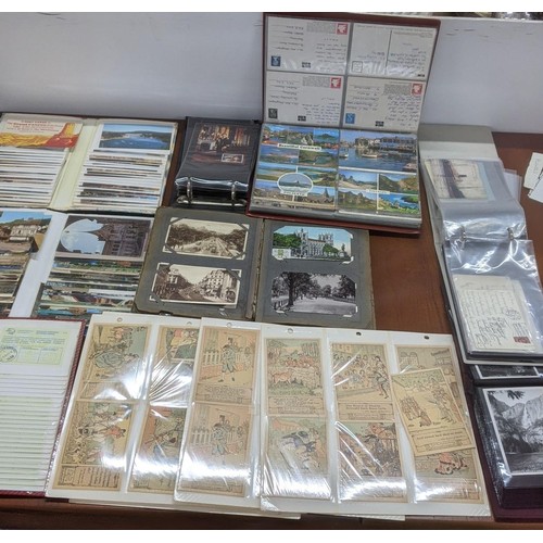 623 - A quantity of postcards, mainly from the USA and Canada, and others, along with a group of postcard ... 