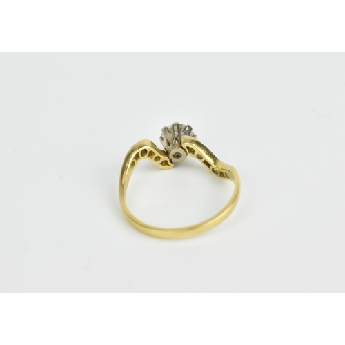 83 - An 18ct gold, platinum and diamond ring, with central brilliant cut diamond, flanked with rows of si... 