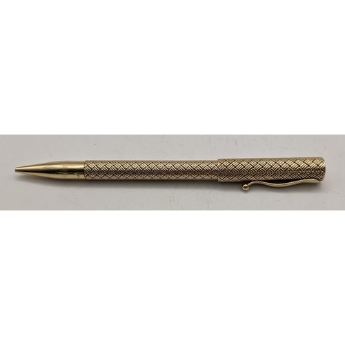 A Tiffany style gold double ended pen & pencil stamped 14ct with hatched pattern weighing 10g
Location: CAB 4