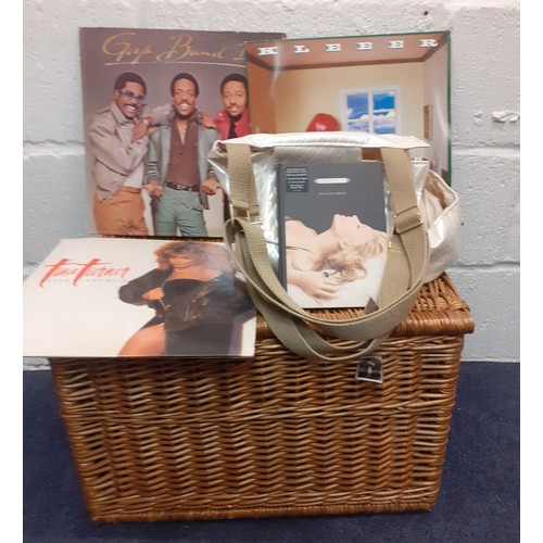 300 - A wicker hamper, 3 LP's to include Tina Turner, a Suzy cream lustre shoulder bag and a Madonna Anast... 