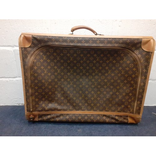 10 - Louis Vuitton-A soft suitcase, made for Louis Vuitton Paris in USA, monogram canvas with leather tri... 