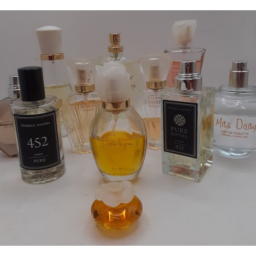 67 - A group of vintage partially filled perfume bottles and eau de toilettes to include 2 x Coty L'Aiman... 