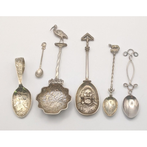 17 - Silver to include a silver spoon hallmarked London 1893, with an embossed bowl decorated with a bear... 