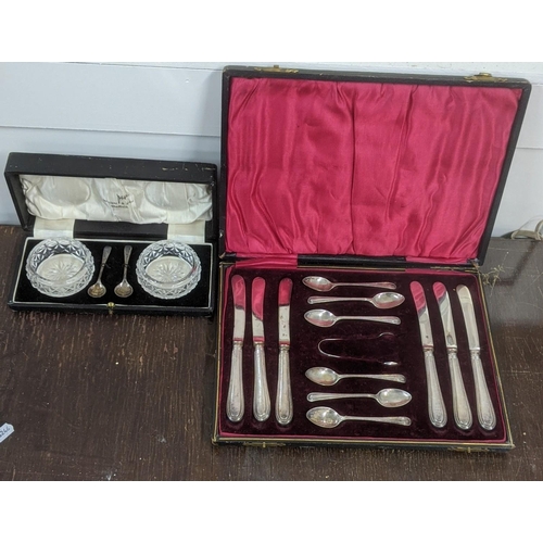 20 - A set of cutlery to include six teaspoons sugar tongs and six silver handle knives in a filled case ... 