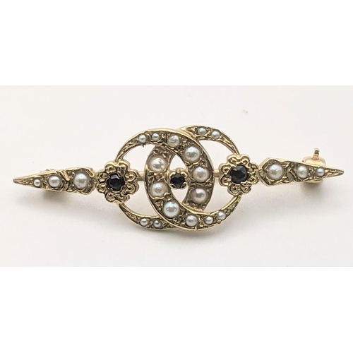 4 - A 9ct gold pearl and blue sapphire bar brooch 3.8g
Location: CAB 8
If there is no condition report s... 