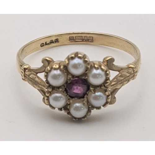 7 - A 9ct gold ruby and pearl daisy ring 1.8g, size 'O'.
Location: CAB 3
If there is no condition report... 