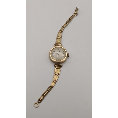 70 - An early 20th century ladies 9ct gold manual wind wristwatch on a gold plated strap
Location: CAB 4
... 