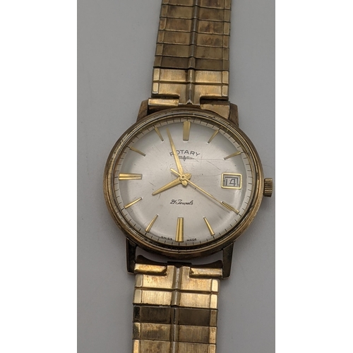 76 - A 9ct gold gent's Rotary wristwatch on a gold plated bracelet Location: CAB 4
If there is no conditi... 