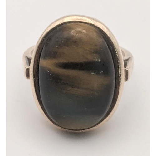 8 - A 9ct gold tigers eye ring weighing 6.5g
Location: RING
If there is no condition report shown,  plea... 