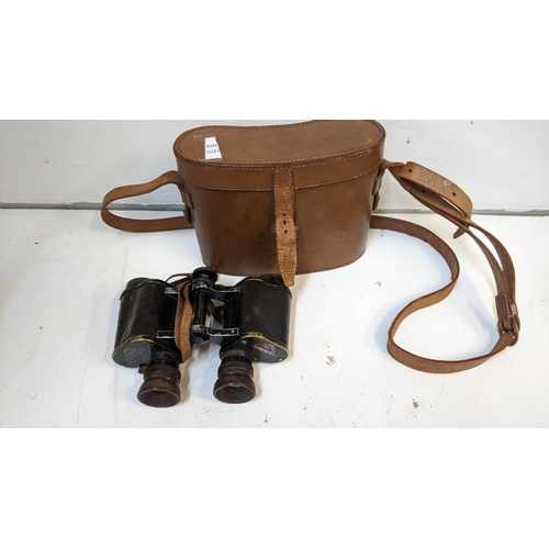 290 - A pair of WWII period filed binoculars CP Goerz Berlin 6 x Marine M89
Location:4.3
If there is no co... 