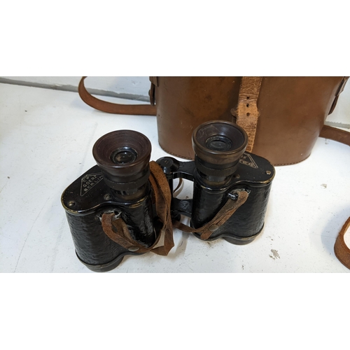 290 - A pair of WWII period filed binoculars CP Goerz Berlin 6 x Marine M89
Location:4.3
If there is no co... 