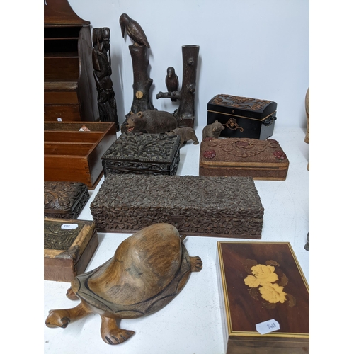 294 - A collection of treen wooden boxes and other items to include three black Forest carved bears, Sorre... 