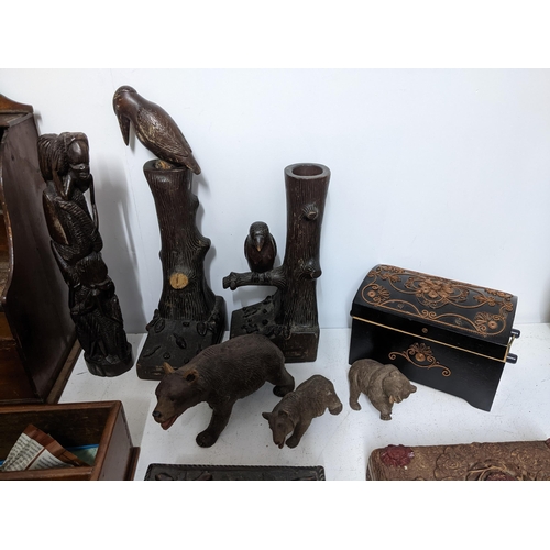 294 - A collection of treen wooden boxes and other items to include three black Forest carved bears, Sorre... 