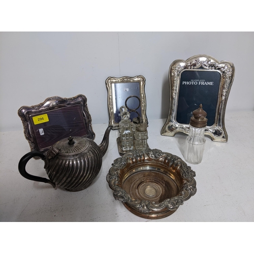 296 - A selection of silver and silver plated items to include a Richard Carrs silver photograph frame (mi... 