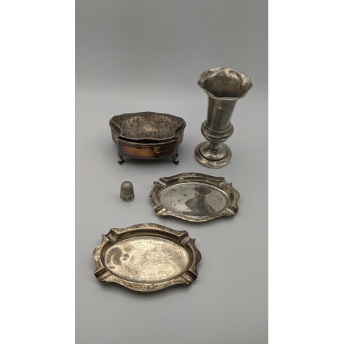 120 - Silver to include a dressing table jewellery box, a small vase, a pair of ash trays and a thimble, t... 