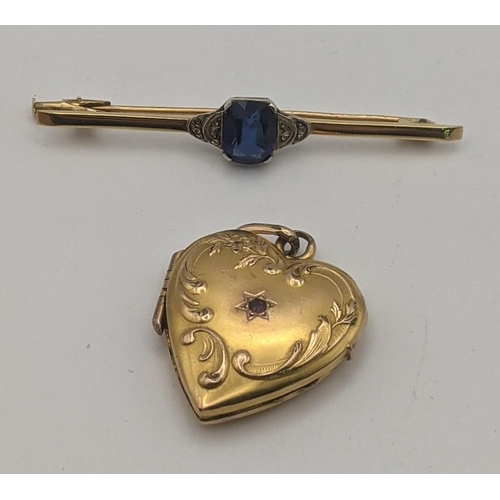 129 - A gold and sapphire bar brooch, tested as 15ct gold 2.1g, together with a gold heart shaped locket, ... 