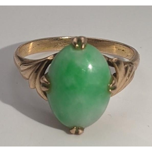 130 - A gold and jade ring tested as 14ct gold, size N, 3.3g Location: CAB 1
If there is no condition repo... 