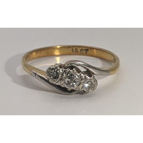 131 - An 18ct gold ring set with three illusion set diamonds Size R, 3.2g
Location: CAB 7
If there is no c... 