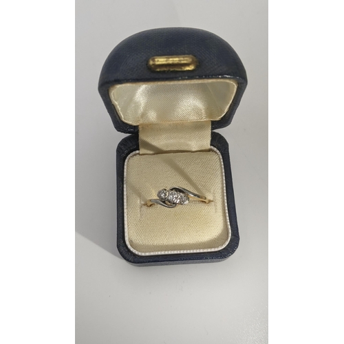 131 - An 18ct gold ring set with three illusion set diamonds Size R, 3.2g
Location: CAB 7
If there is no c... 