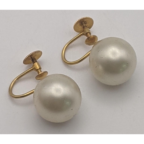 133 - A pair of 9ct gold and pearl ciro screw back earrings 7.2g
Location: CAB 7
If there is no condition ... 
