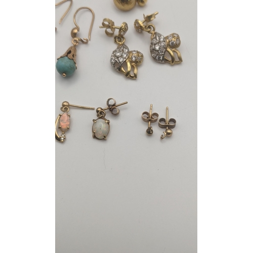 134 - A pair of gold and pace stone earrings tested as 15ct gold 4.6g together with other yellow metal ear... 
