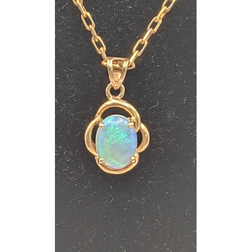 135 - A gold and opal pendant stamped 10k on a 9ct gold box link necklace 39cm L3.1g together with another... 