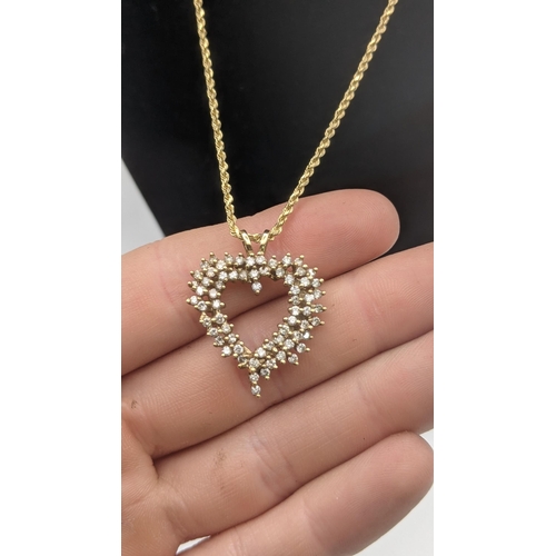 147 - A 10ct gold diamond heart shaped cluster pendant 3.8g, on a 14ct gold rope twist style necklace 4.4g... 