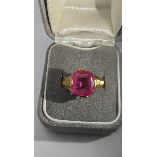 154 - An Indian gold and ruby coloured ring, 6.6g, tested as 22ct gold, size R 1/2 Location: CAB 2
If ther... 