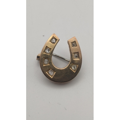 157 - A gold and diamond bar brooch fashioned as a horseshoe, tested as 14ct gold 4g, together with a fash... 