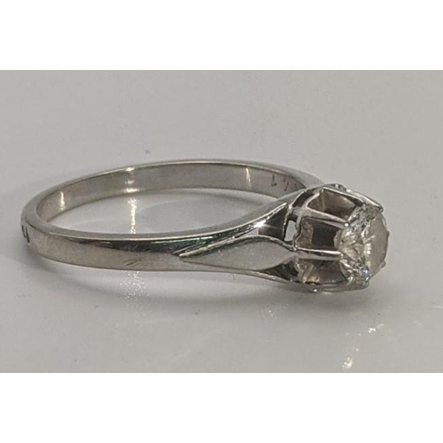 164 - A white gold and 0.47 brilliant cut diamond ring in a claw setting, tested as 15ct gold, size M 2.7g... 