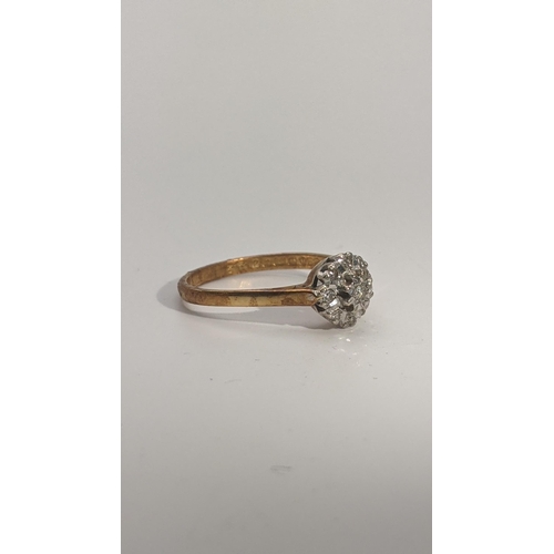 166 - An 18ct gold and diamond ring fashioned as a flower head size Q, 2.9g Location: CAB 1
If there is no... 