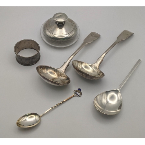 187 - Silver to include a pair of sauce ladles, a napkin ring, and two spoons, 139g and silver and glass p... 